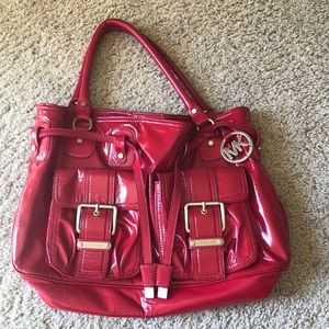 Red Michael Kors handbag